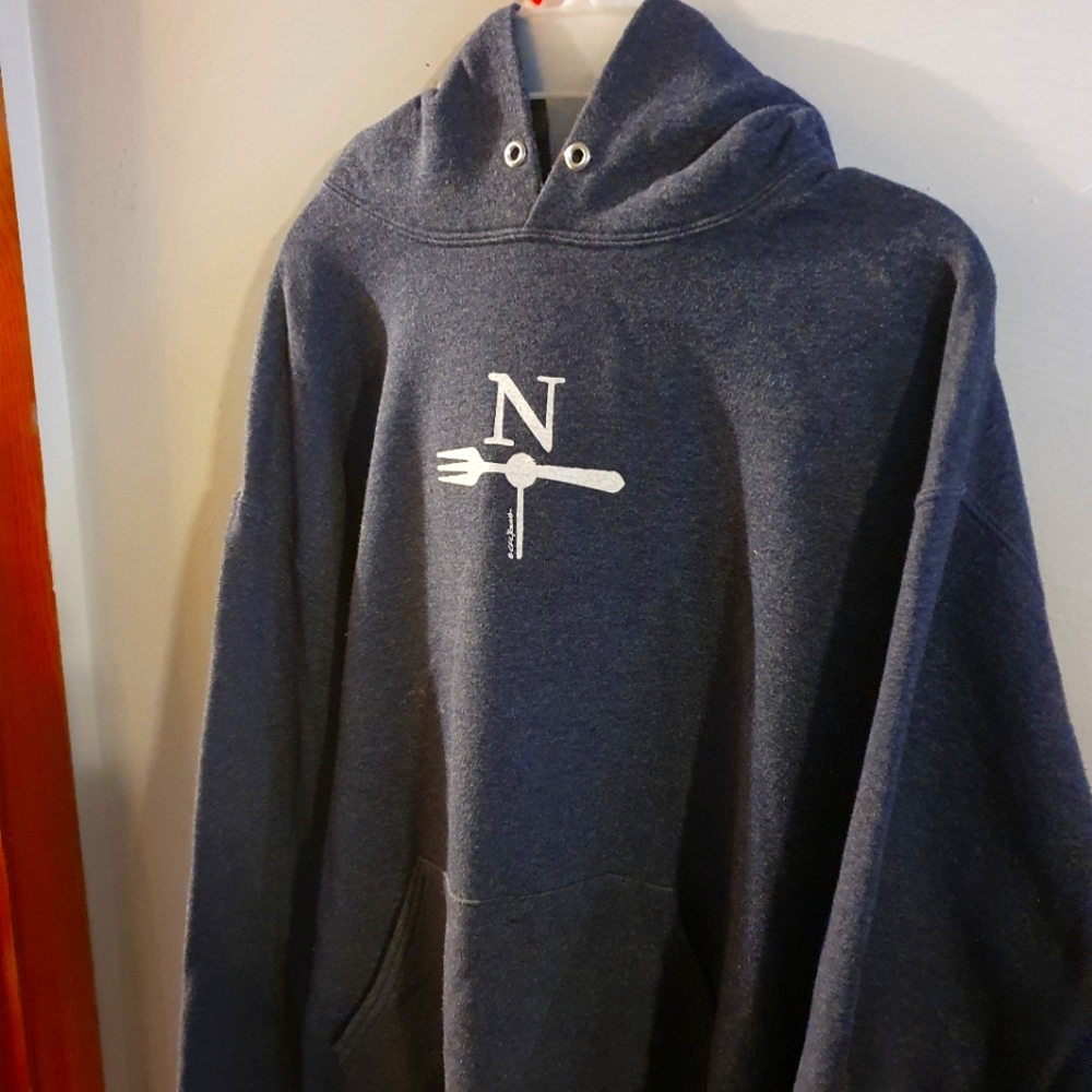 A dark Grey pullover Hoodia,